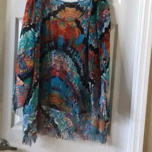 Pull over sheer blouse with fringe bottom